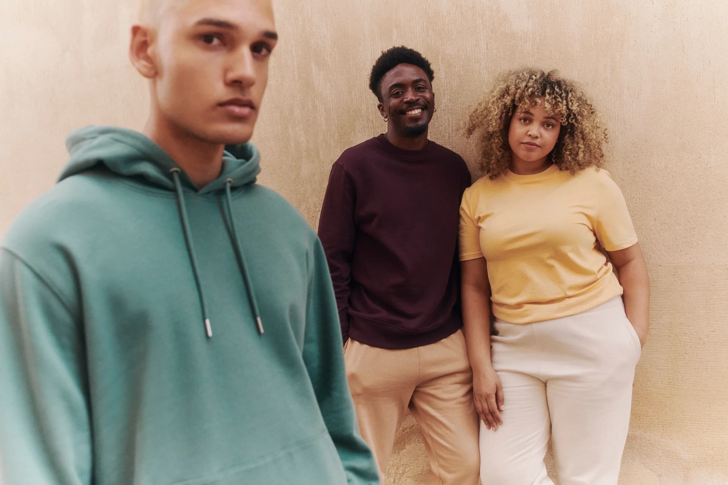 Team wearing coordinated branded hoodies